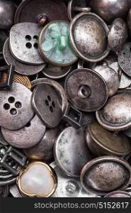 set of retro iron buttons. Large set of stylish old-fashioned metal buttons for clothes
