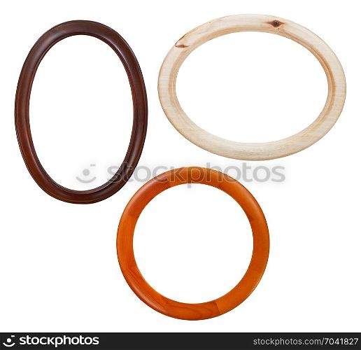 set of round wooden picture frames with cut out canvas isolated on white background