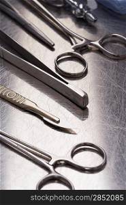 Set of scissors and teasers, close-up