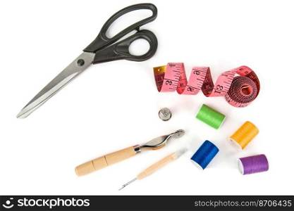 Set of sewing accessories isolated on white background.