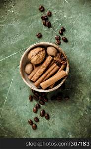 Set of spices and coffee beans on rustic background . Set of spices and coffee beans on rustic background, flat lay, top view