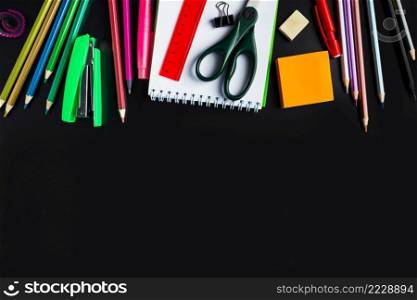 Set of stationery on a black background. Back to school concept. Place for text.. Set of stationery on black background. Back to school concept. Place for text.