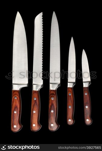 Set of steel kitchen knives, isolated on black with clipping path