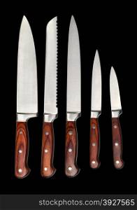 Set of steel kitchen knives, isolated on black with clipping path
