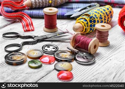 Set of tailor from the spool of lace,scissors,thread and buttons