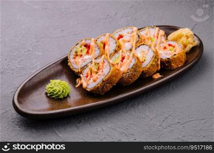 set of tempura fried sushi rolls on plate