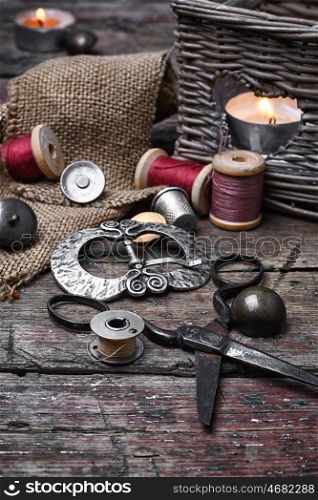 set of threads and buttons. Spools of sewing threads and buttons from clothing