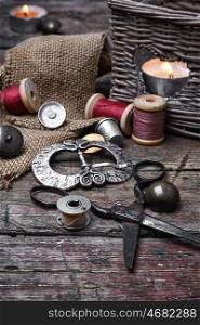 set of threads and buttons. Spools of sewing threads and buttons from clothing