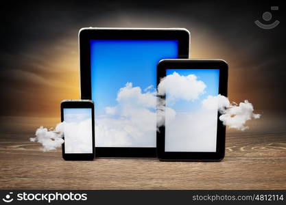 Set of three computer devices. Set of three computer devices with clouds illustration