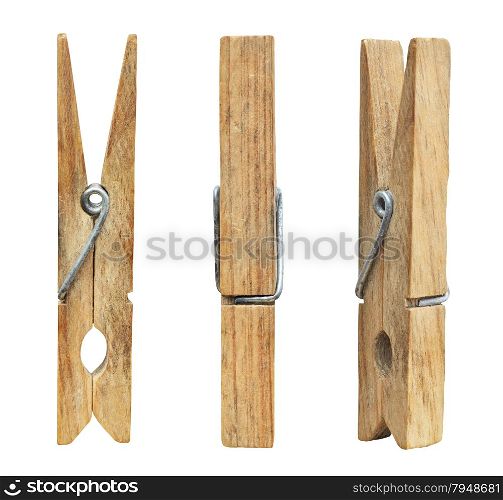 Set of three wooden cloth pegs isolated on white background