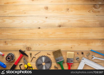 set of tools and instruments at wooden surface background