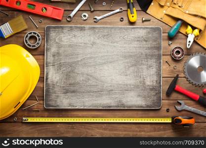 set of tools and instruments at wooden table surface background