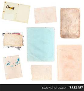 set of various old paper sheets and pictures isolated on white background