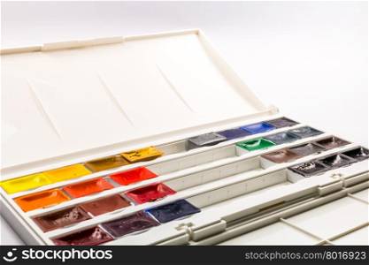 Set of water colors with brush in plastic box