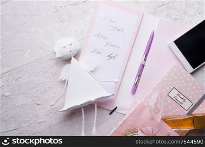 set of woman plans at new year with angel and gifts. concept shot