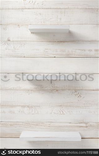 set of wooden shelf on white wall background texture