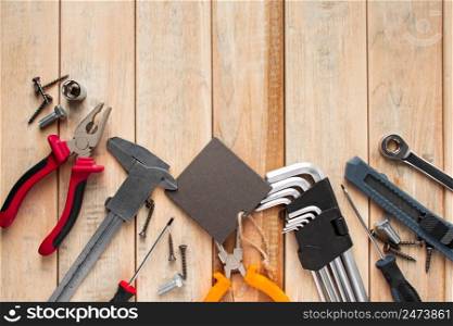 Set of work tools on a wooden background. Festive greeting card concept for Father&rsquo;s day. Set of work tools on a wooden background. Festive greeting card concept for Father&rsquo;s day.