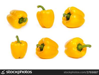 set of yellow bell sweet peppers isolated on plain white background.