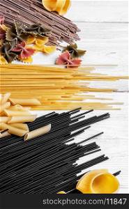 Set raw spaghetti and macaroni on the kitchen table