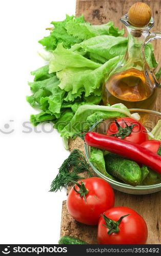Set vegetable and jug of vegetable oil isolated on the white background