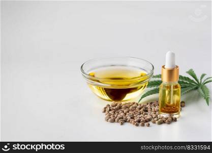 Sets of legalized marijuana features with CBD oil in bottle with dropper lid, sativa green hemp, and hemp seeds. Cannabis product for copyspace and advertisement.. Sets of legalized marijuana features with CBD oil in bottle with dropper lid.