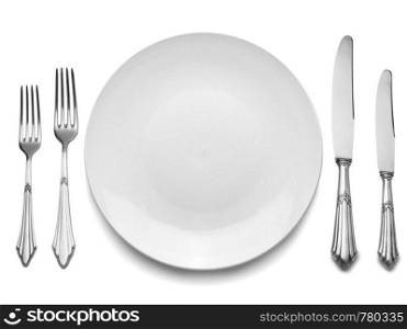 Setting with Plate, Knifes & Forks (clipping path) This set is old, it is not brand new, the flaws in the silverware are natural. This set has often served.