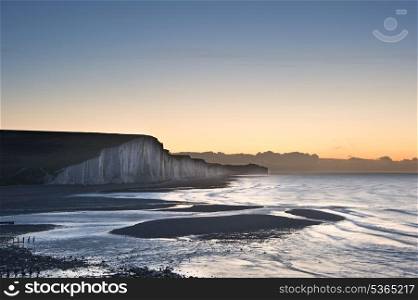 Seven Sisters chalk cliffs in England during Winter sunrise