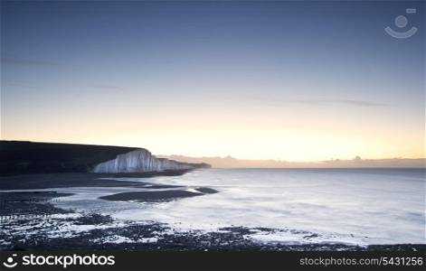 Seven Sisters chalk cliffs in England during Winter sunrise