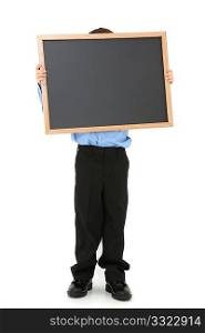 Seven year old caucasian boy in suit with chalkboard over white background. No faces.