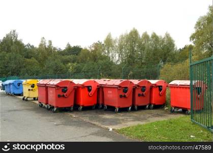 Several containers platique of waste in a park of recovery.