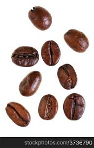 several falling roasted coffee beans isolated on white background