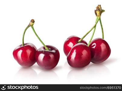 Several perfect sweet cherries isolated on white background