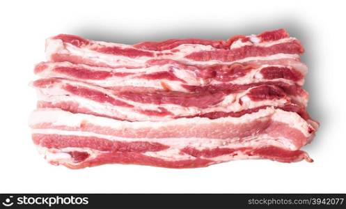 Several pieces of bacon stacked in layers isolated on white background