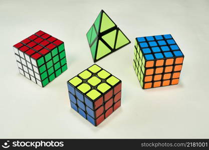 several solved rubik&rsquo;s cubes on white background.. several solved rubik&rsquo;s cubes on white background
