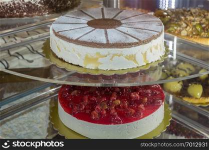 Several Types of Stuffed Cakes inside a Pastry Display Stand.. Several Types of Stuffed Cakes inside a Pastry Display Stand