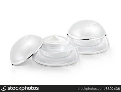 Several white rounded cosmetic jar on white background