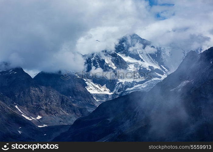 Severe HImalayas mountains in clouds. India