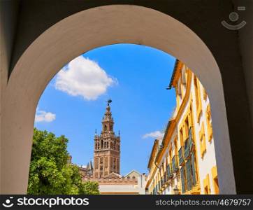 Seville cathedral Giralda tower from Alcazar arch door of Sevilla Andalusia Spain