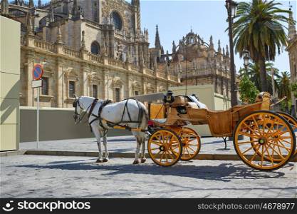 Seville Cathedral with horse carriage in Sevilla Andalusia Spain