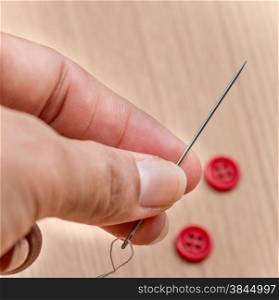 Sewing Buttons Indicating Needlework Seamstress And Stitches