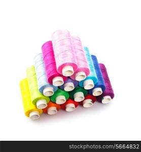 Sewing multicolored threads isolated on white background