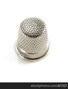sewing thimble isolated on white background