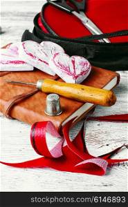 Sewing tool for needlework and leather scraps. Crafts with leather materials