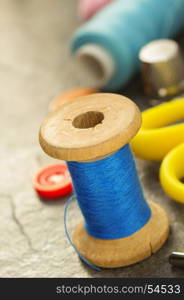 sewing tools and accessories on table background