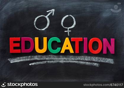 Sex education concept on a smudged blackboard