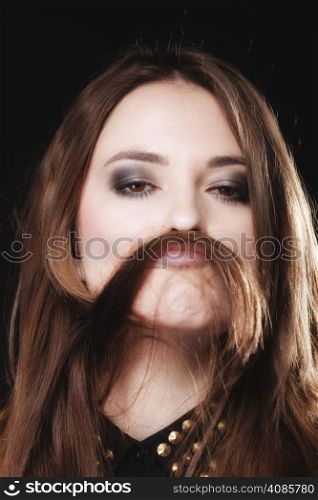 Sex equality and feminism concept - woman teen girl with hair moustaches making silly face on black