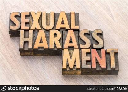 sexual harassment word abstract in vintage letterpress wood type