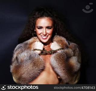Sexual model in a fur coat