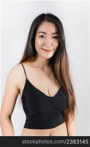 Sexy Asian woman in a black dress On white background
