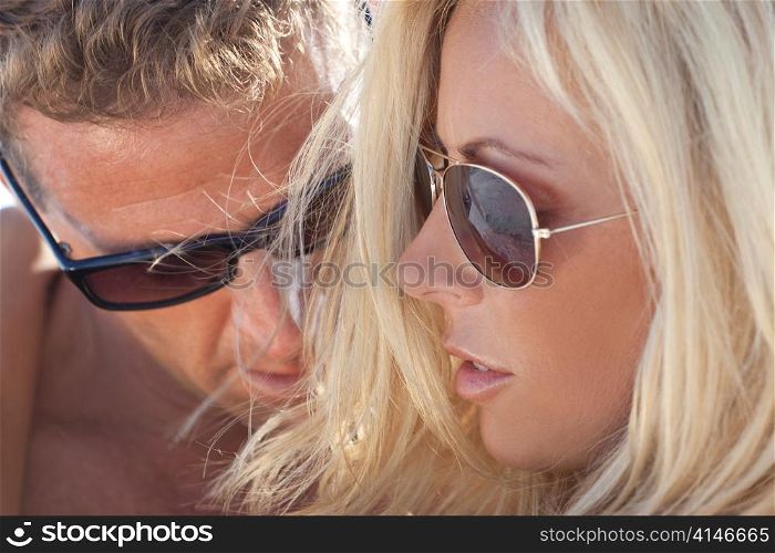 Sexy Attractive Man and Woman Couple Happy In Sunglasses